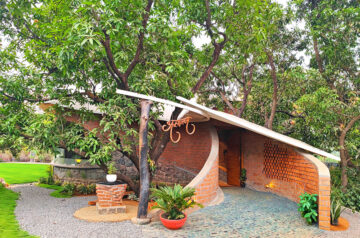Organically-Arranged Brick Walls Form Biophilic Asmalay House By Blurring Boundaries In India