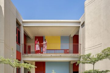 Kamat & Rozario Architecture Built School With Fortress-Like Blank Walls And Colored Bridges