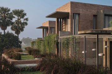 Earth brick meets exposed concrete at the nature-infused ‘jungalow 2’ house in india
