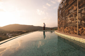 Farm House By Earthscape Studio Is Wrapped By Gabion Wall To Filter Light And Airflow In India