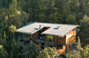 Timber villa in the woods by studio lotus floats among himalayan forest
