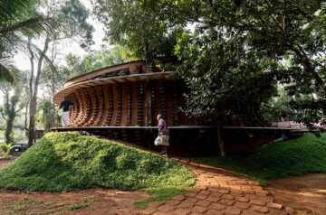 Wallmakers weaves recycled plastic toys into the earthen facade of this home in india