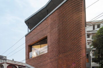 Patterned brickwork enfolds multi-leveled residence by purple ink studio in india