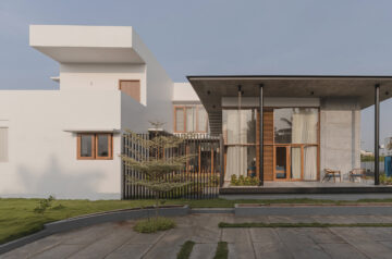 Modern farmhouse in india sets up patterned exposed brick facade