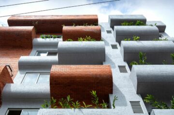 Curving balconies double as environmental filters at housing complex in bangalore