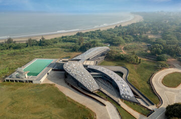 Grid shell with trapezoidal paneling tops MOFA studio’s wave-like water sports center in goa